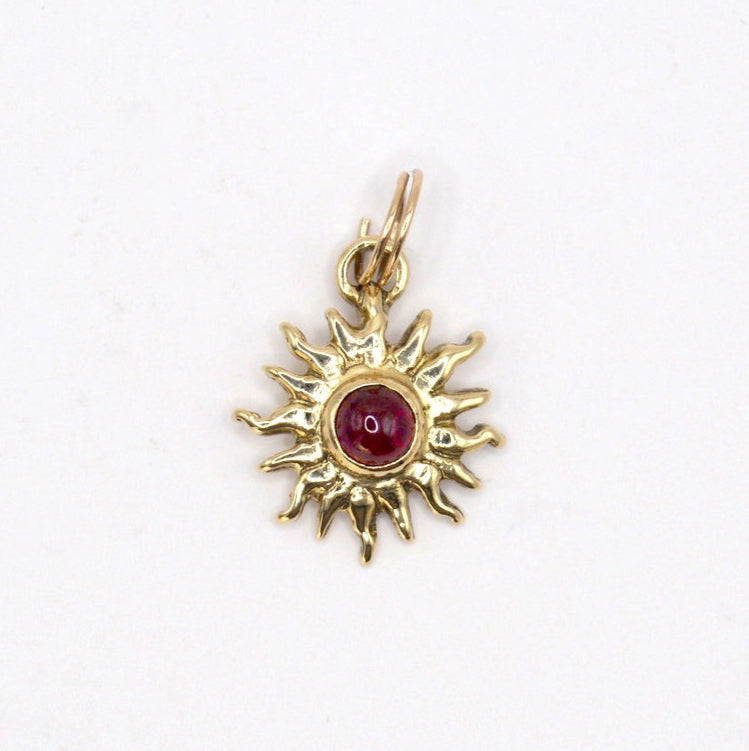 9ct Gold Sun Ra Talisman Charm with Rhodolite Garnet