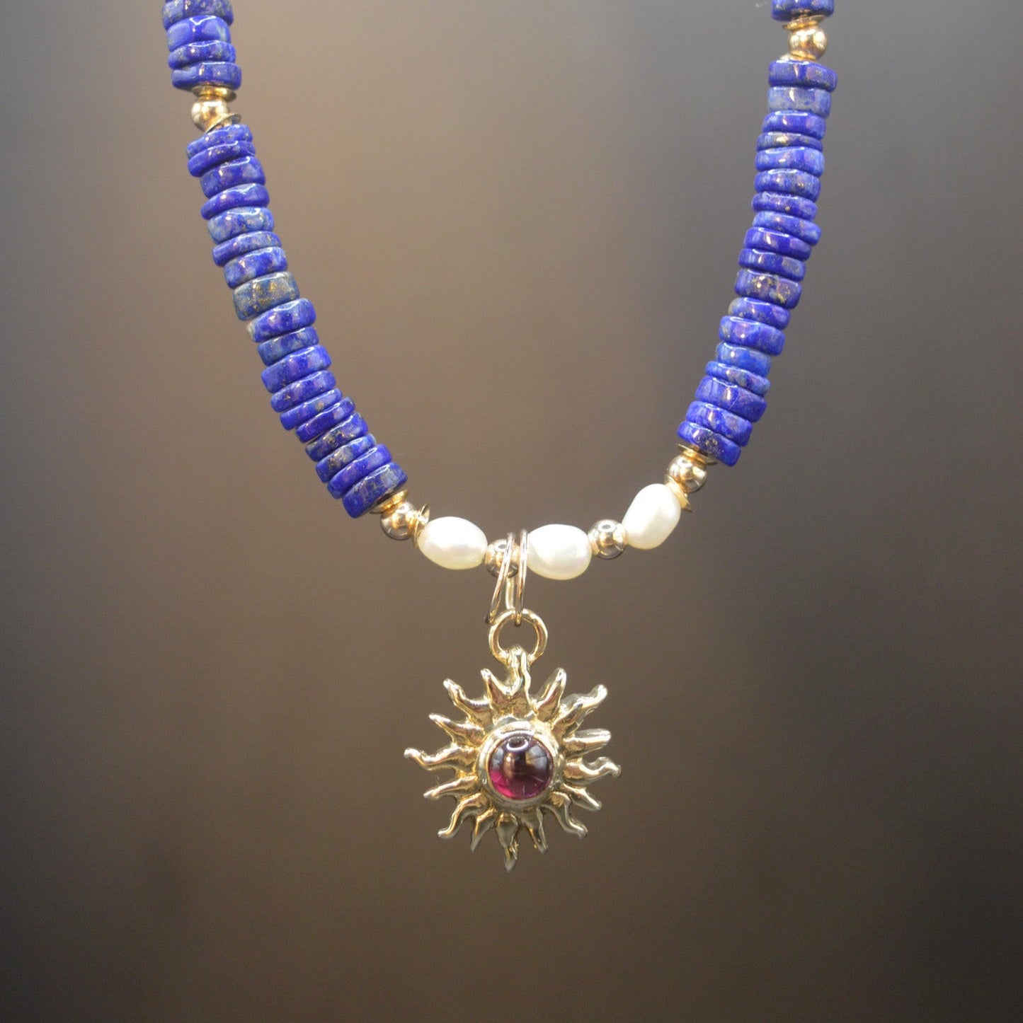9ct Gold Sun Ra Talisman Charm with Rhodolite Garnet