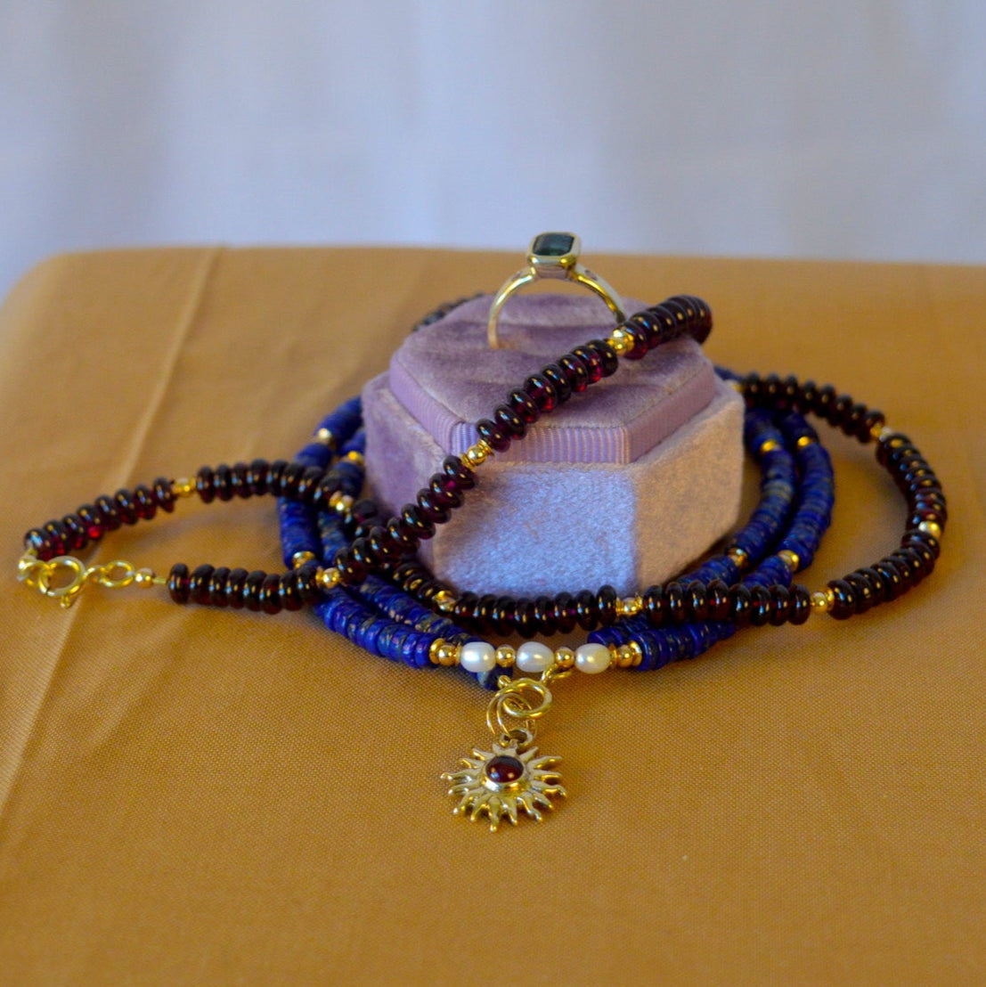 9ct Gold Sun Ra Talisman Charm with Rhodolite Garnet
