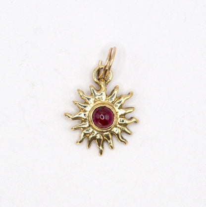 9ct Gold Sun Ra Talisman Charm with Rhodolite Garnet
